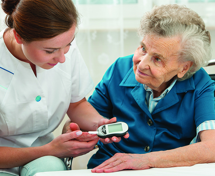 Woman talking to doctor